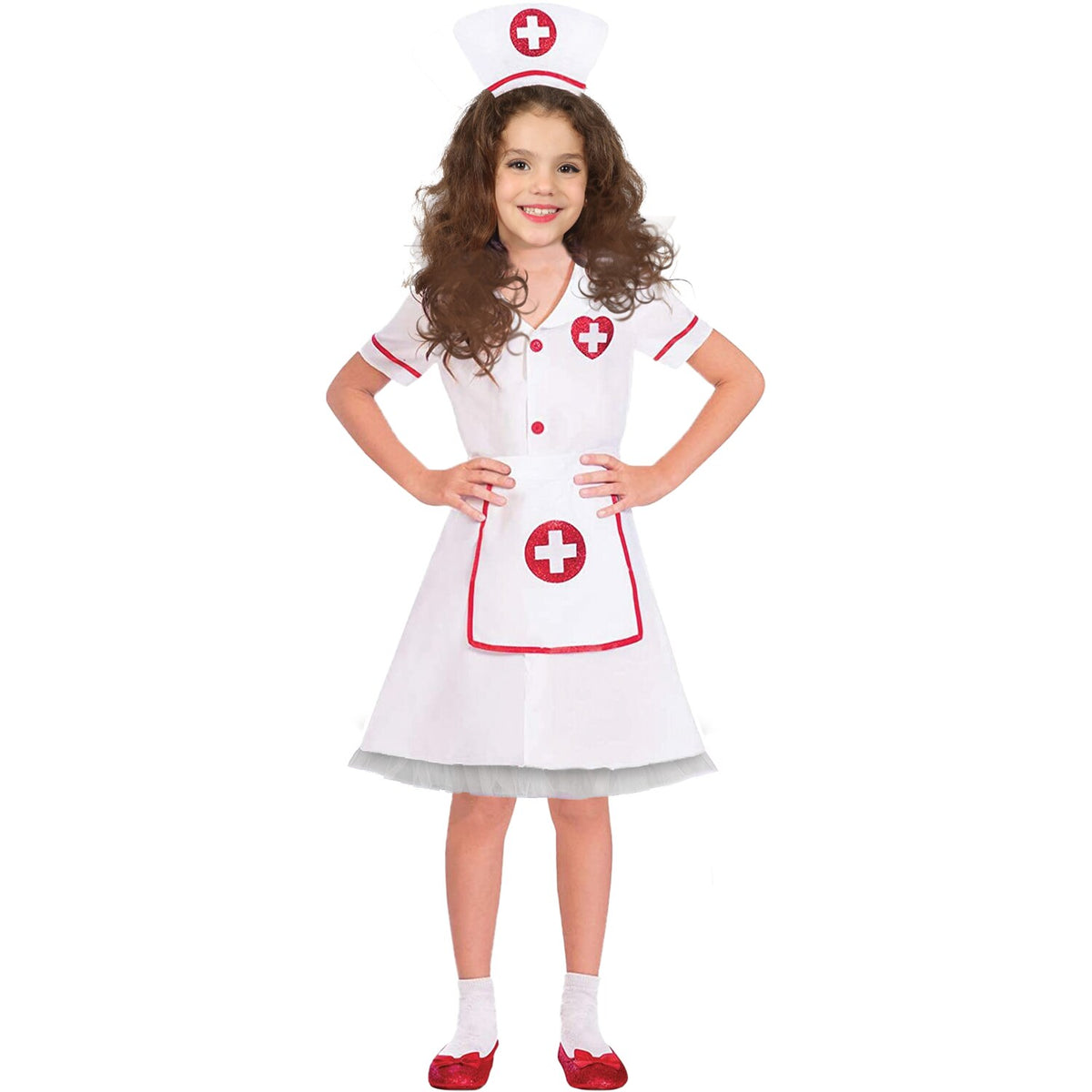 Model wearing Lola Stars girls' nurse costume: white dress with red trim, white apron and white nurse cap