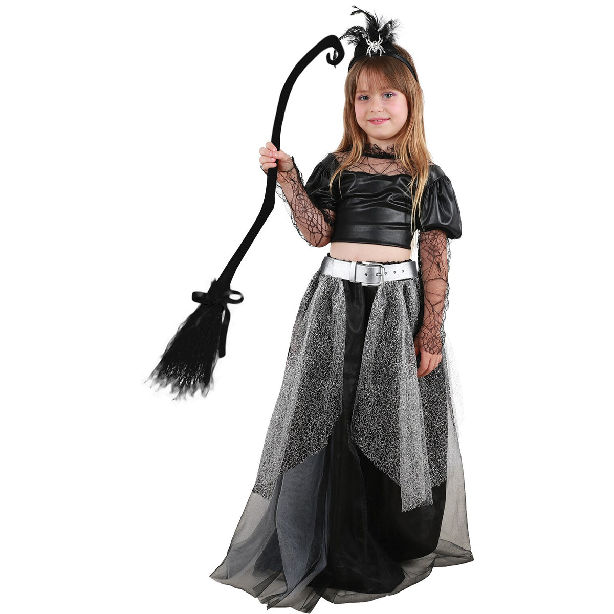 Model wearing Lola Stars girls' witch costume: black web-sleeve top, long black and silver skirt and feather headband
