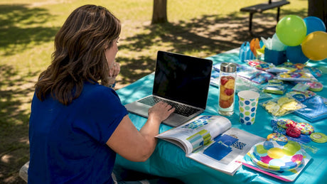 Woman shopping online for party supplies