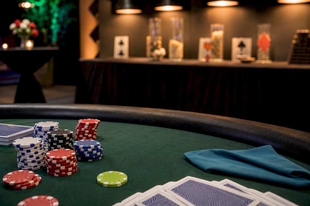 Casino night table with green felt and decorations