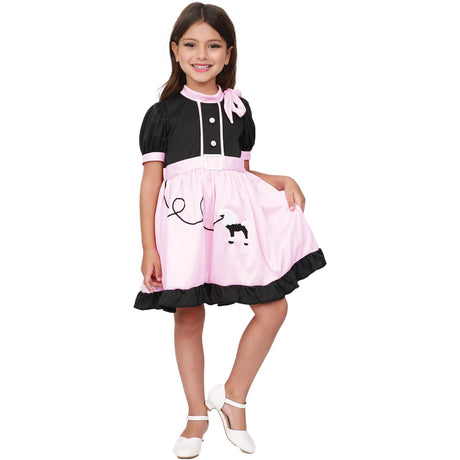 Model wearing Lola Stars teen girls' 50s costume: black and pink poodle dress with ruffled hem and pink neck scarf